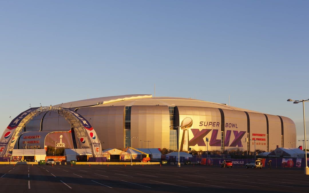 Evening cast golden color on silver dome of University of Phoenix Arizona Cardinal Stadium